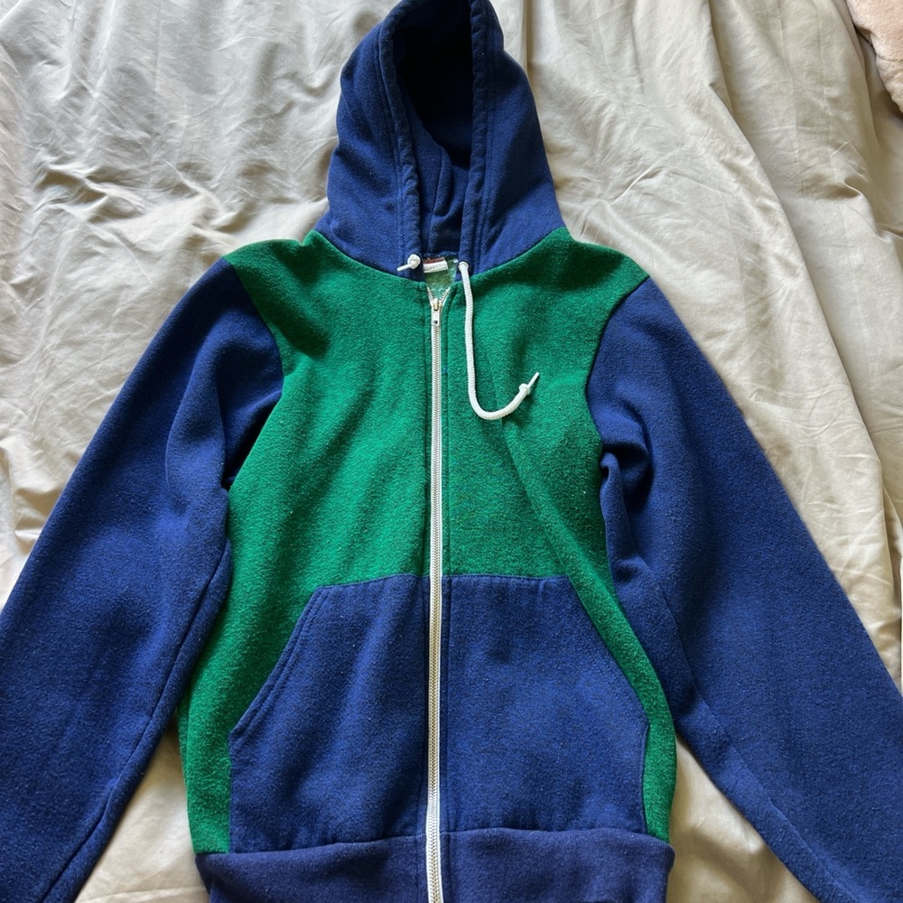 blue and green zip-up hoodie. sized extra small but totally fits as a small.